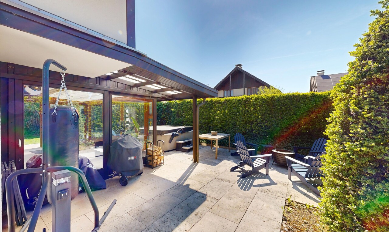 patio / terrace with a patio and a fire pit