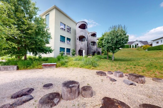 außenansicht mit day time, property visible, und stuckverkleidung