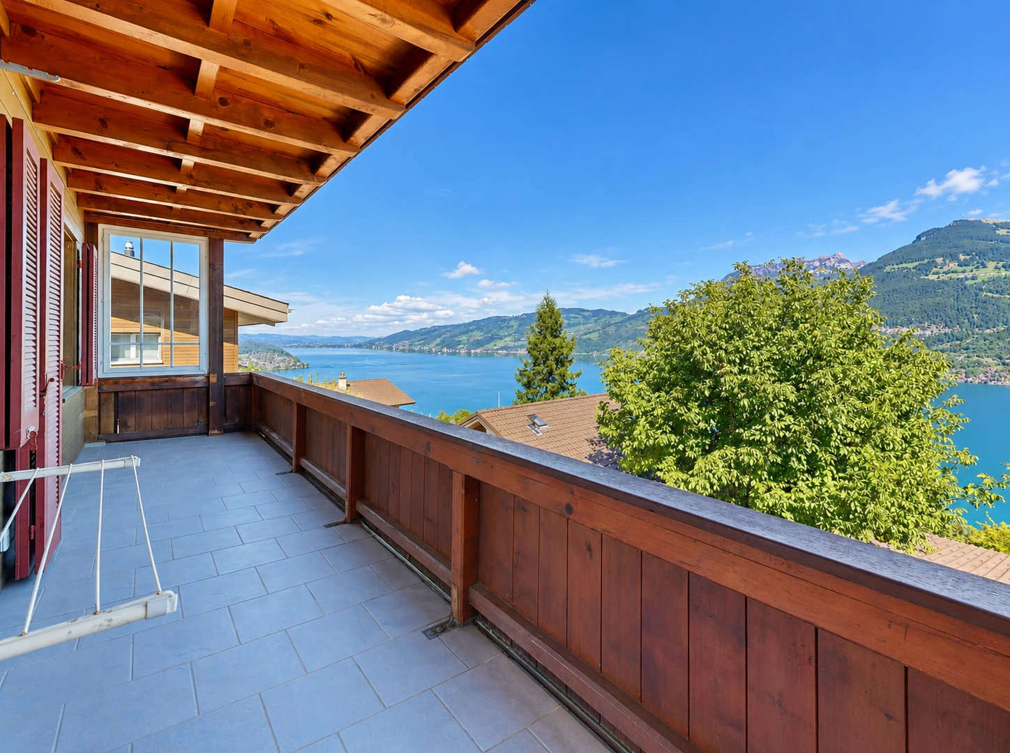 balcony with a water and mountain view