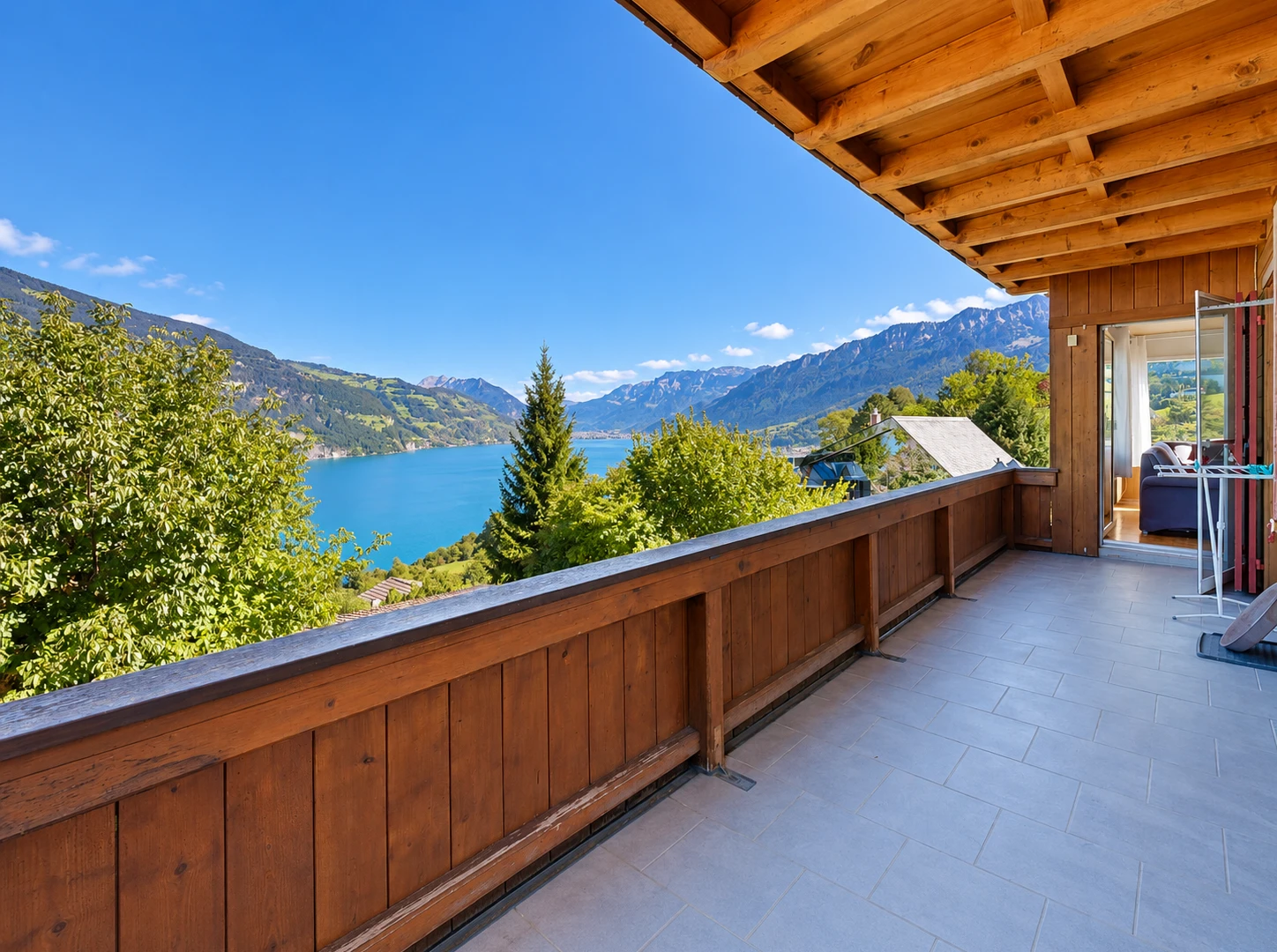 balcony with a water and mountain view