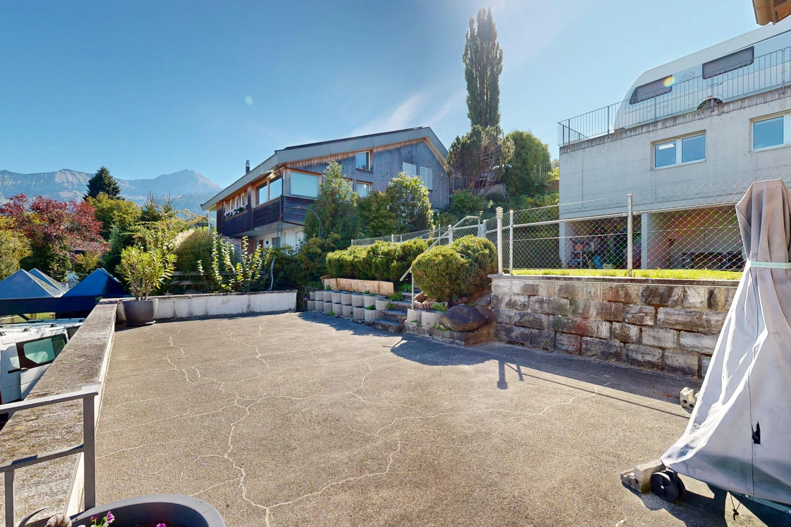 patio / terrace with a mountain view