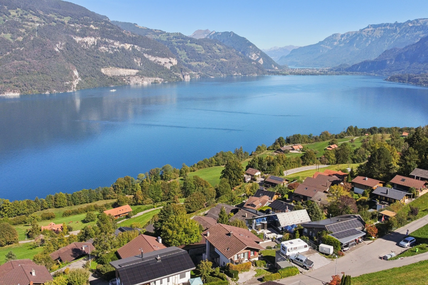 water view featuring nearby suburban area and a mountain backdrop