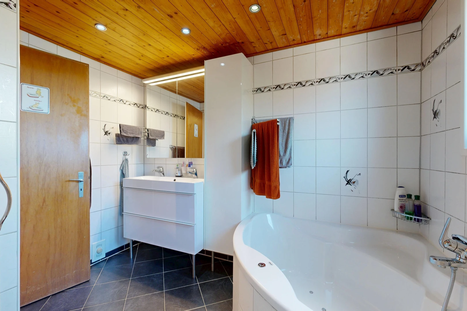 full bath featuring wood ceiling, tile walls, a bath, vanity, and recessed lighting