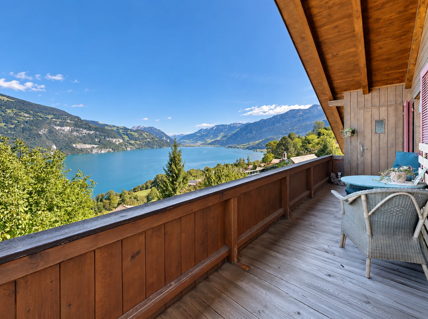 balcony featuring a water and mountain view