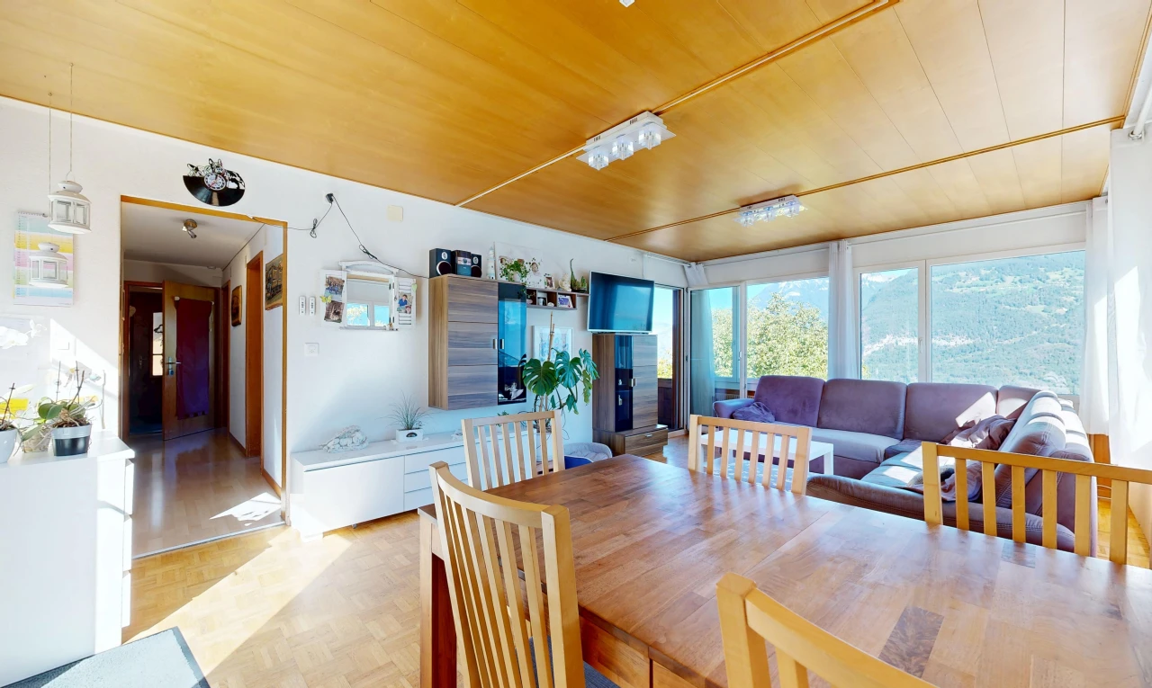 dining space with parquet floors and wooden ceiling