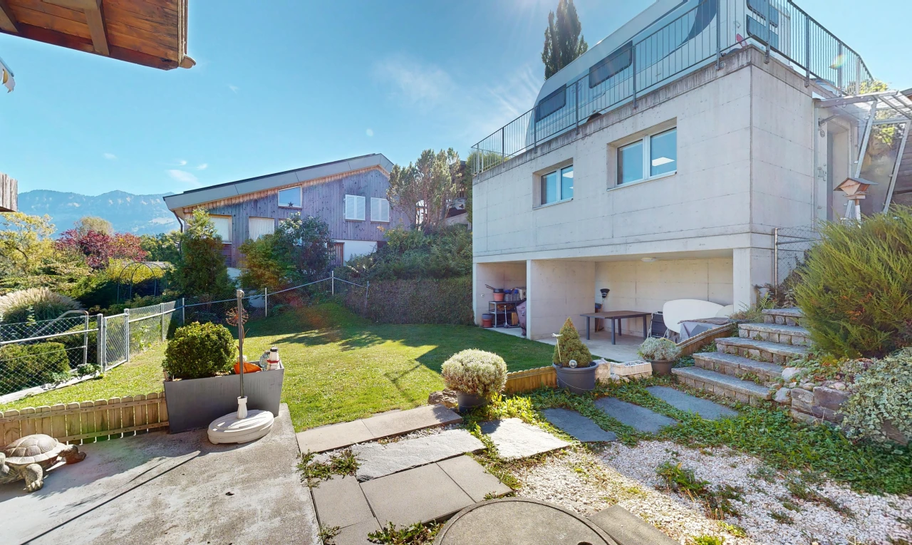 view of home featuring a patio
