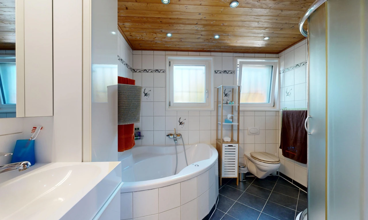 bathroom with wooden ceiling, a stall shower, tile walls, a bath, and dark tile patterned floors