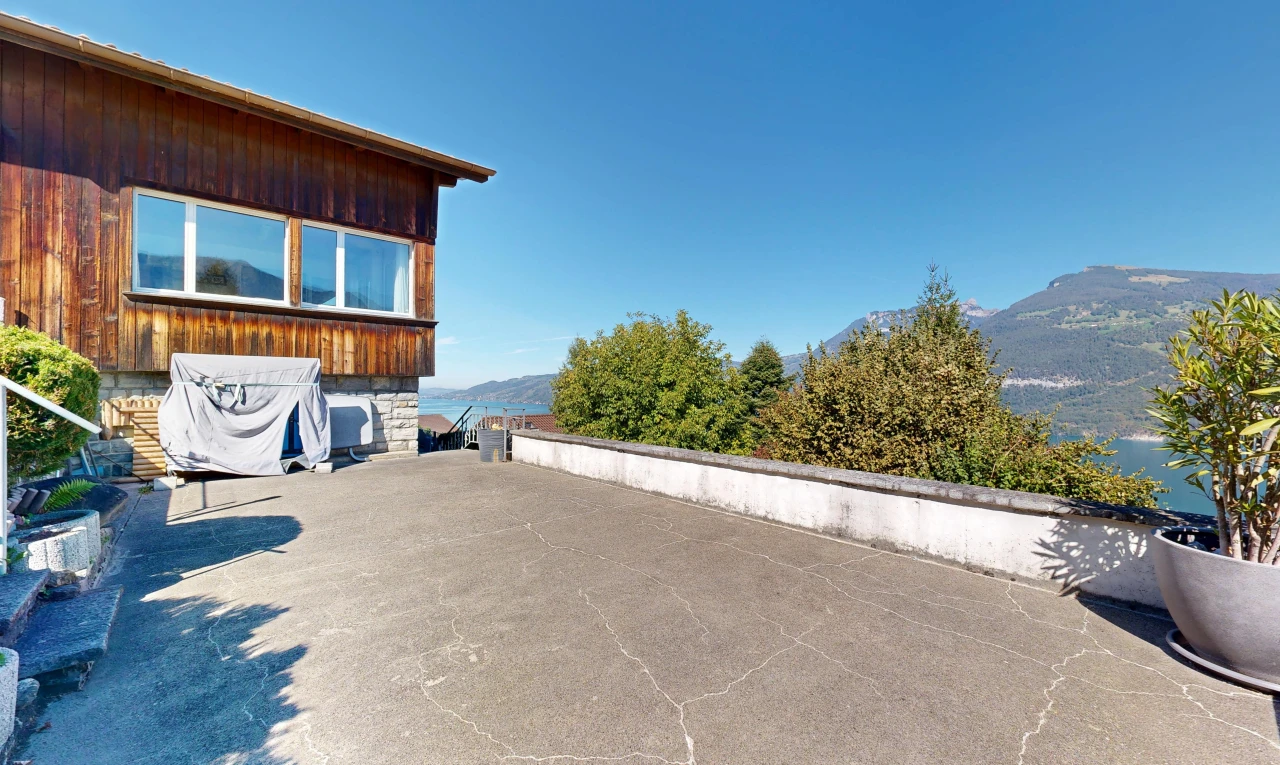 patio / terrace with a mountain view