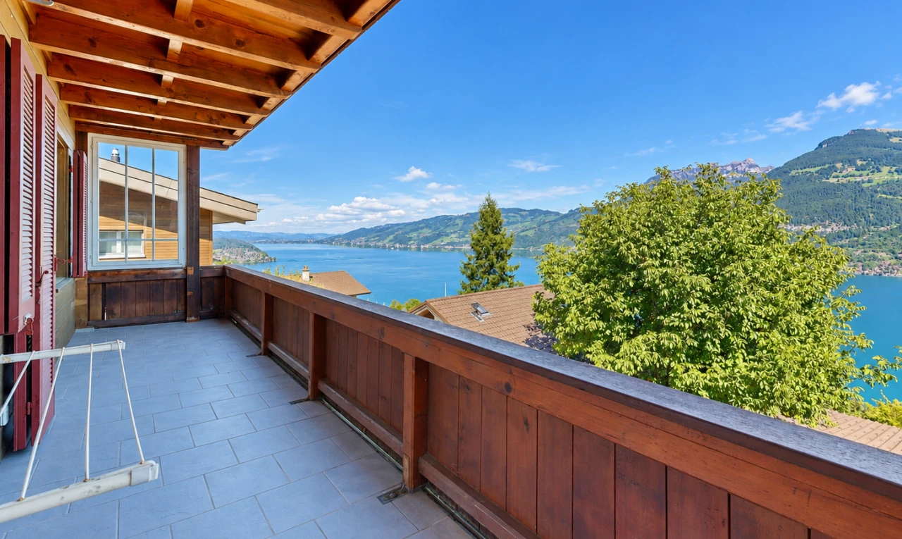 balcony with a water and mountain view