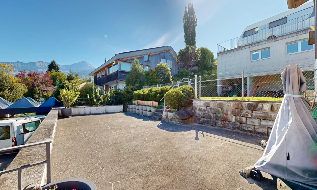 patio / terrace with a mountain view