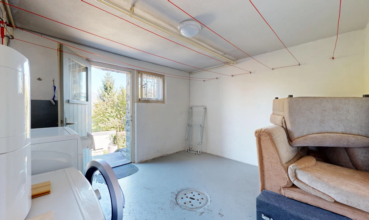 room / bedroom with access to exterior and concrete floors
