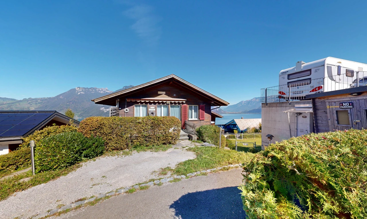 outdoor house featuring a mountain view