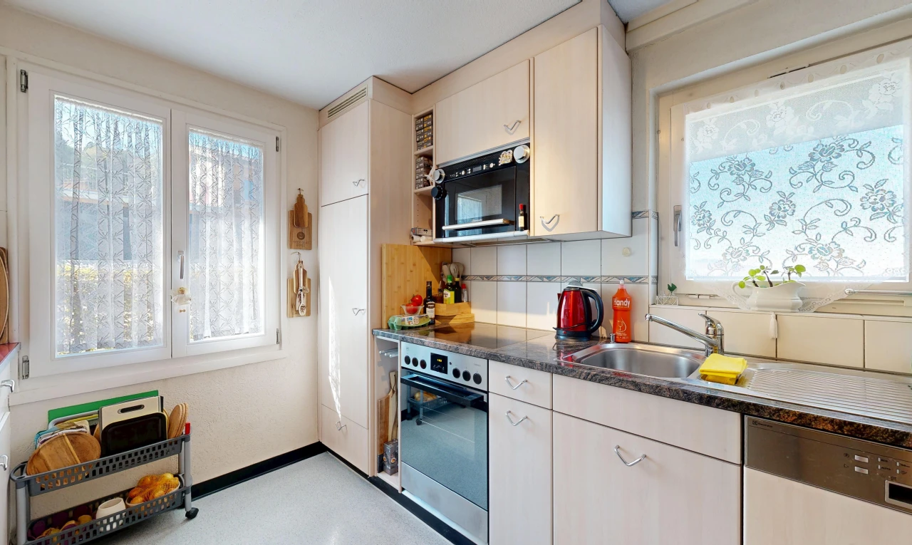 kitchen with stainless steel appliances, healthy amount of natural light, and decorative backsplash