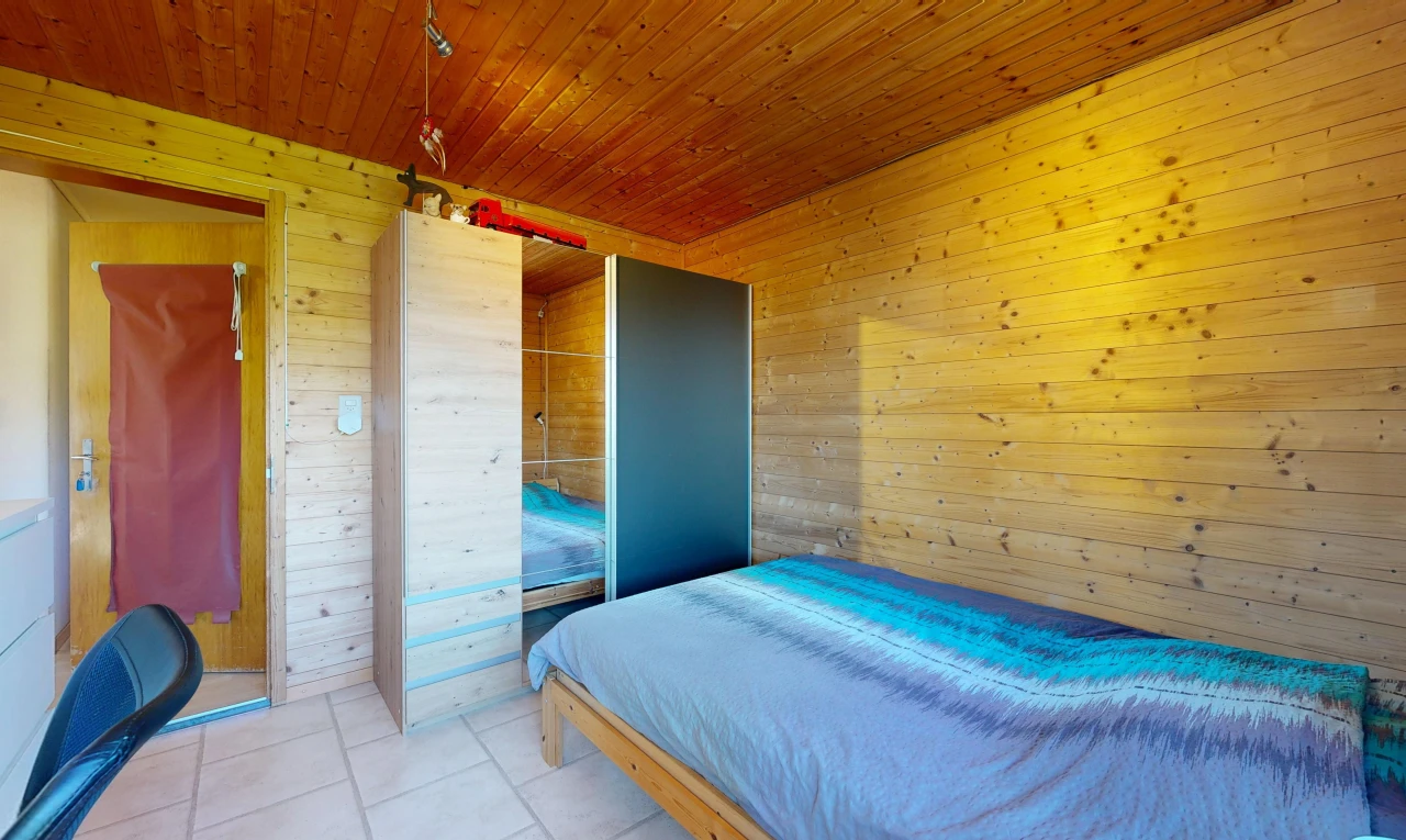 room with wooden walls and wood ceiling