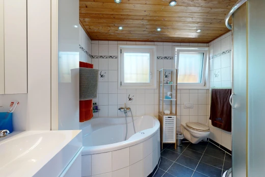 bathroom with wooden ceiling, a stall shower, tile walls, a bath, and dark tile patterned floors