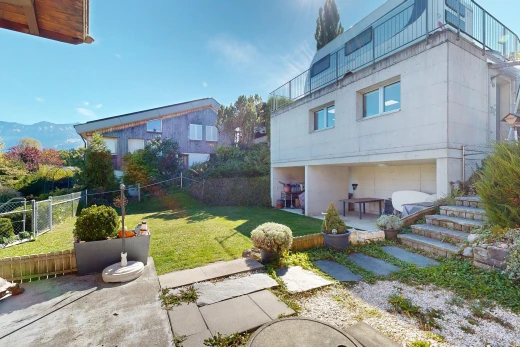 view of home featuring a patio