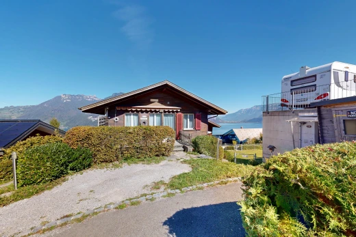 outdoor house featuring a mountain view