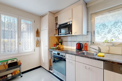 kitchen with stainless steel appliances, healthy amount of natural light, and decorative backsplash