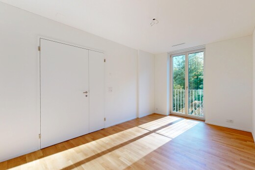 pièce vide avec cloison sèche, drywall, sol en finition bois, wood finish floor, et inside property