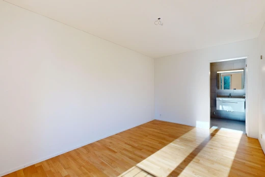 pièce vide avec cloison sèche, drywall, sol en finition bois, wood finish floor, et inside property