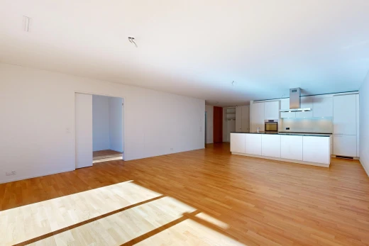 pièce vide avec cloison sèche, drywall, sol en finition bois, wood finish floor, et light floor