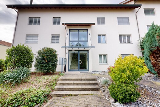 außenansicht mit stuckverkleidung, property visible, und overcast