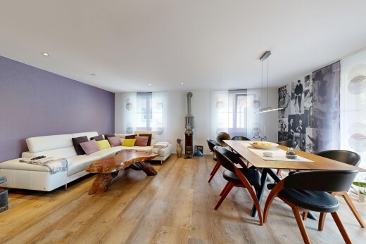 living area featuring light wood-style flooring and recessed lighting