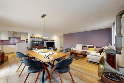 living room with light wood-type flooring and recessed lighting