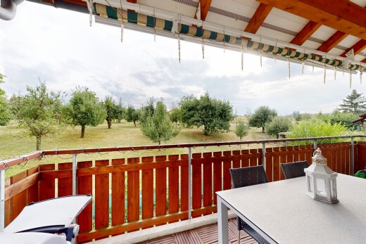 balcony with outdoor dining area