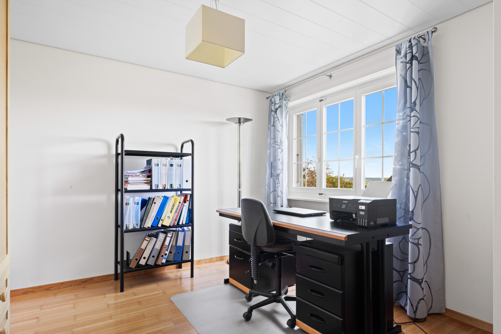 office space with light wood-type flooring