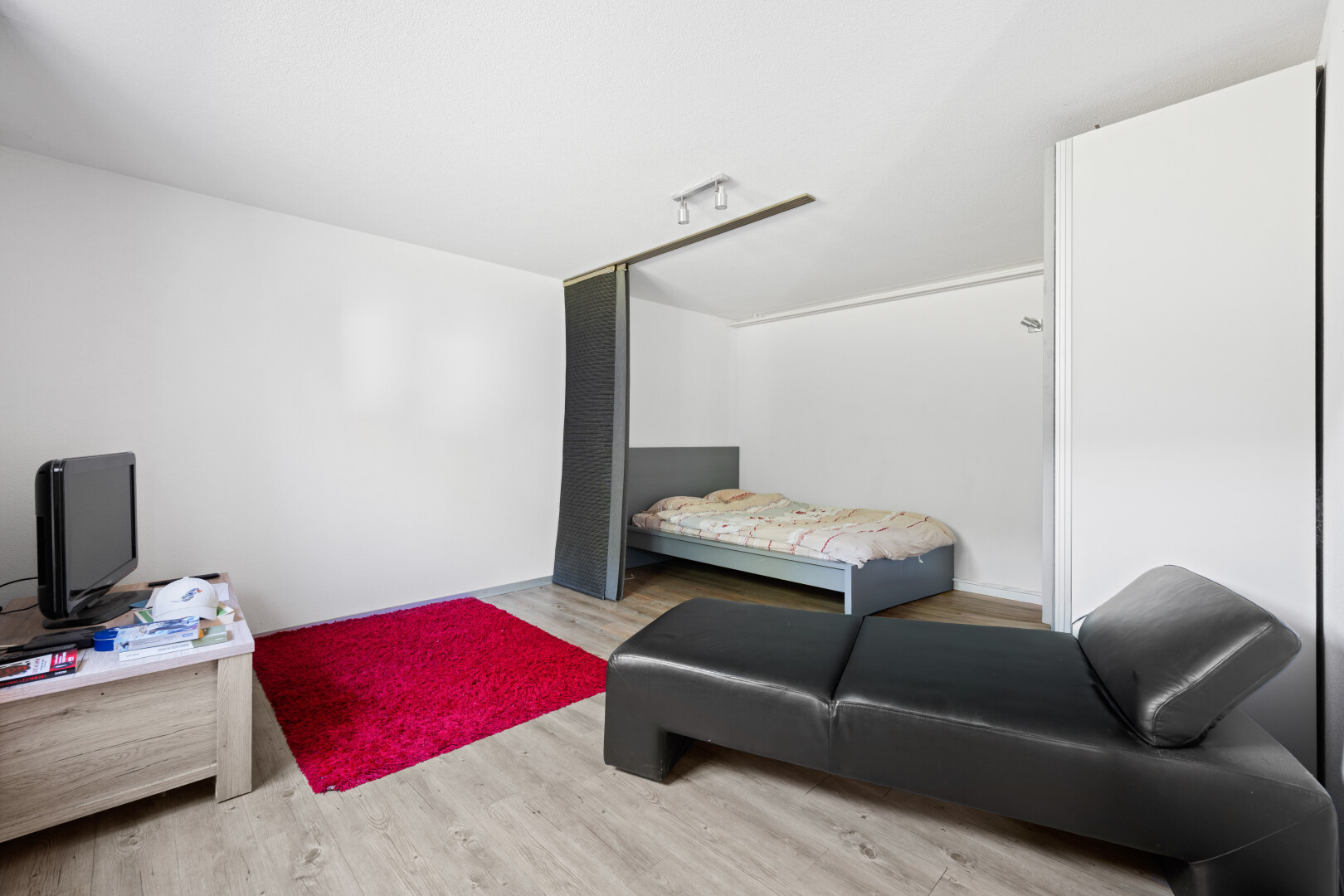 room / bedroom featuring light wood finished floors