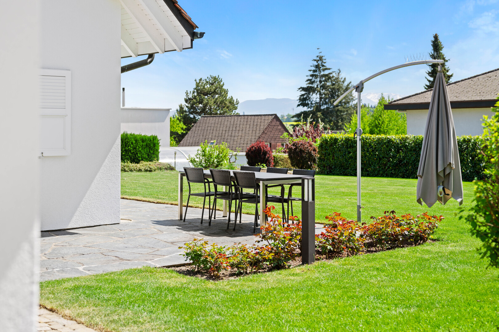 garden with a lawn, a patio, and outdoor dining space