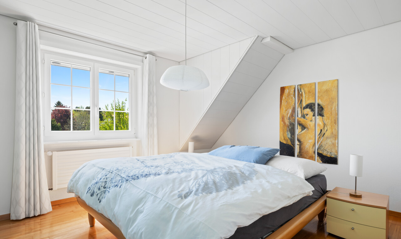 room / bedroom with wood finished floors, radiator heating unit, and wood ceiling