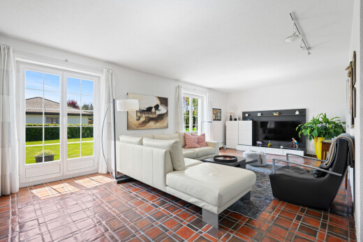 living room featuring rail lighting