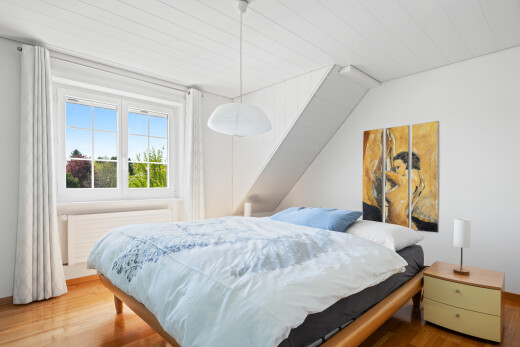 room / bedroom with wood finished floors, radiator heating unit, and wood ceiling