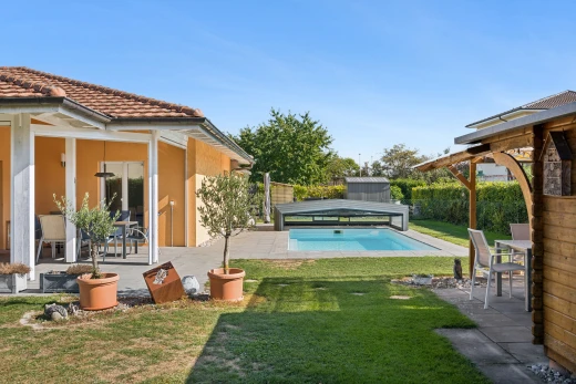 schwimmbad mit schwimmbad, essbereich im freien, terrasse, rasen, und from property