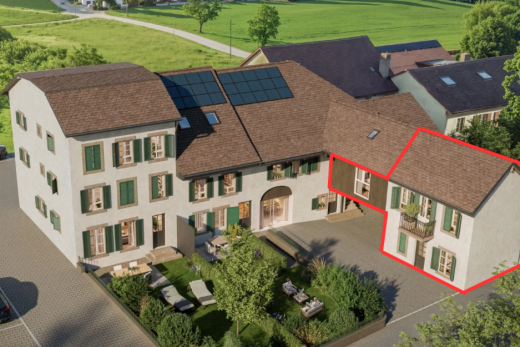 view of property featuring roof mounted solar panels and a shingled roof