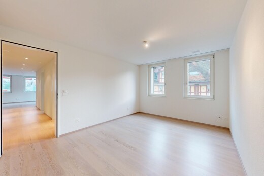 leerer raum mit wood finish floor, holzfußboden, inside property, drywall, und gipskartonwand