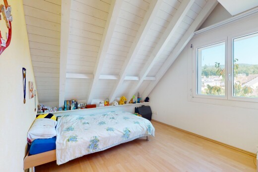 zimmer / schlafzimmer mit inside property, beamed ceiling, balkendecke, vaulted ceiling, und dachschräge