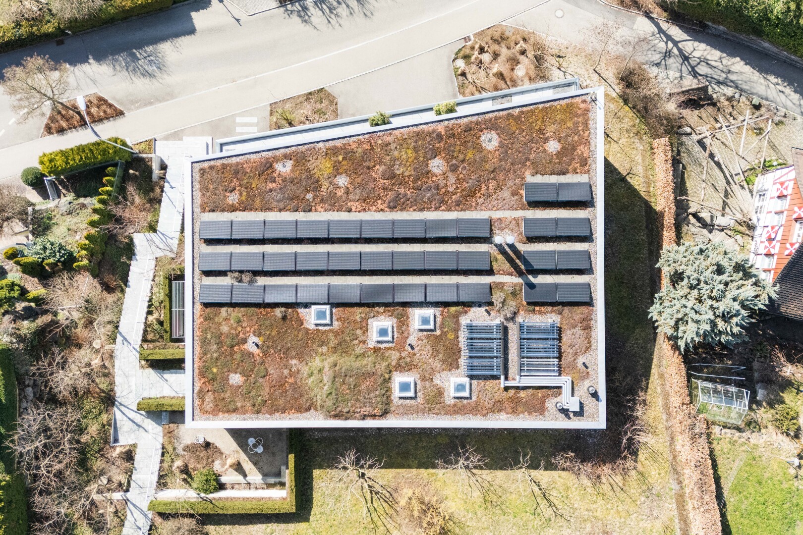 view of home featuring roof mounted solar panels