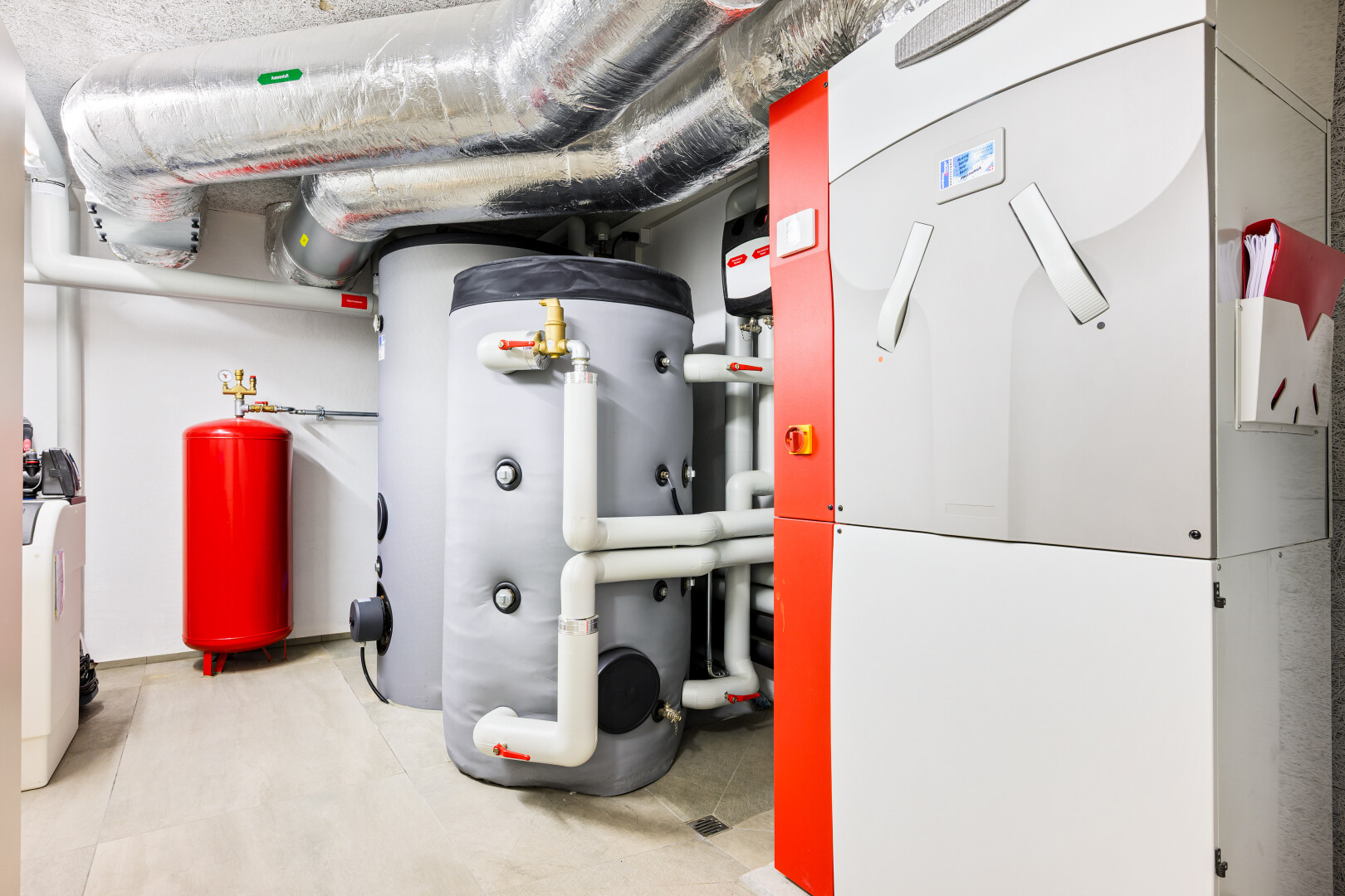 kitchen with heating unit and gas water heater