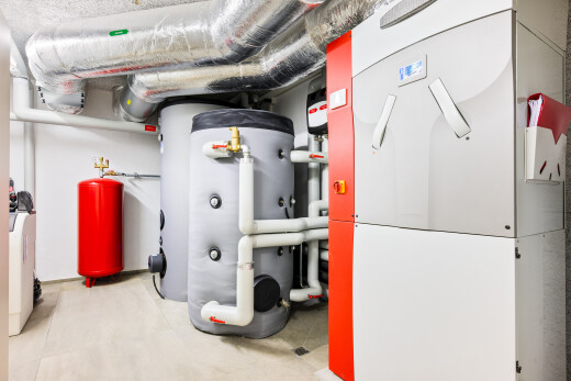kitchen with heating unit and gas water heater