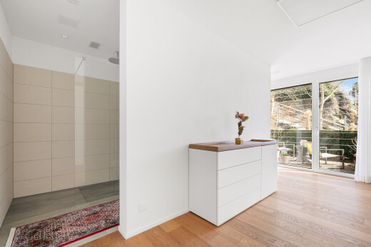 unfurnished room with light wood-style floors and baseboards