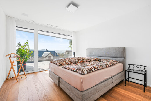 room with light wood-style floors and access to outside