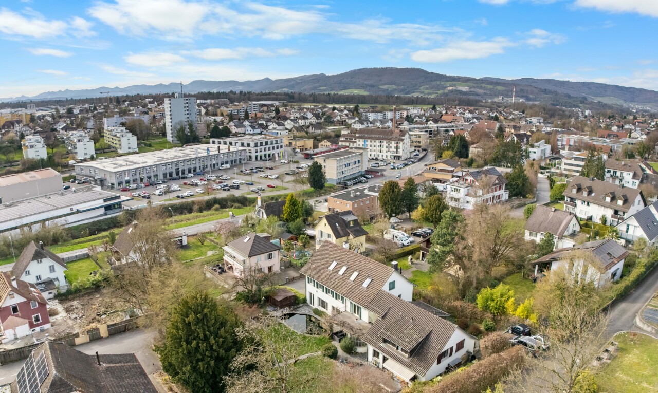 view of property with a mountain view and a city view