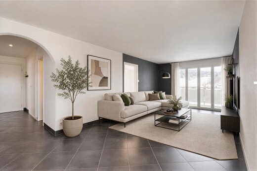 salon avec passages en arc, inside property, drywall, cloison sèche, et baseboards wall