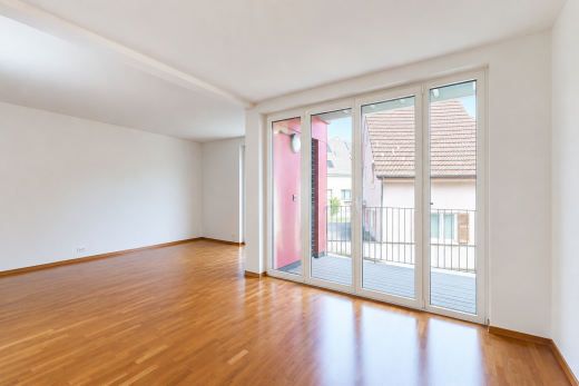 unfurnished room featuring wood finished floors and baseboards