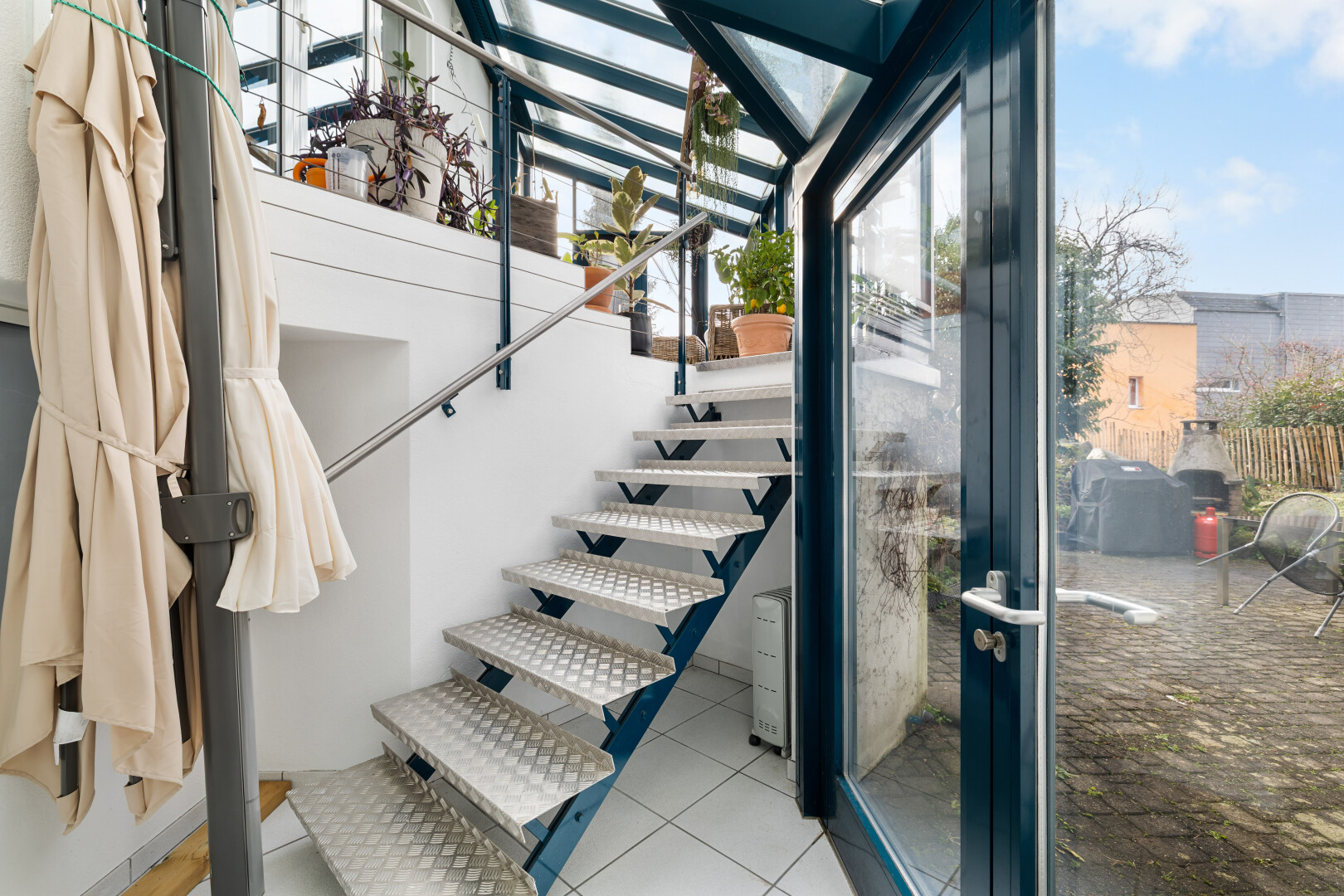 staircase with tile patterned flooring