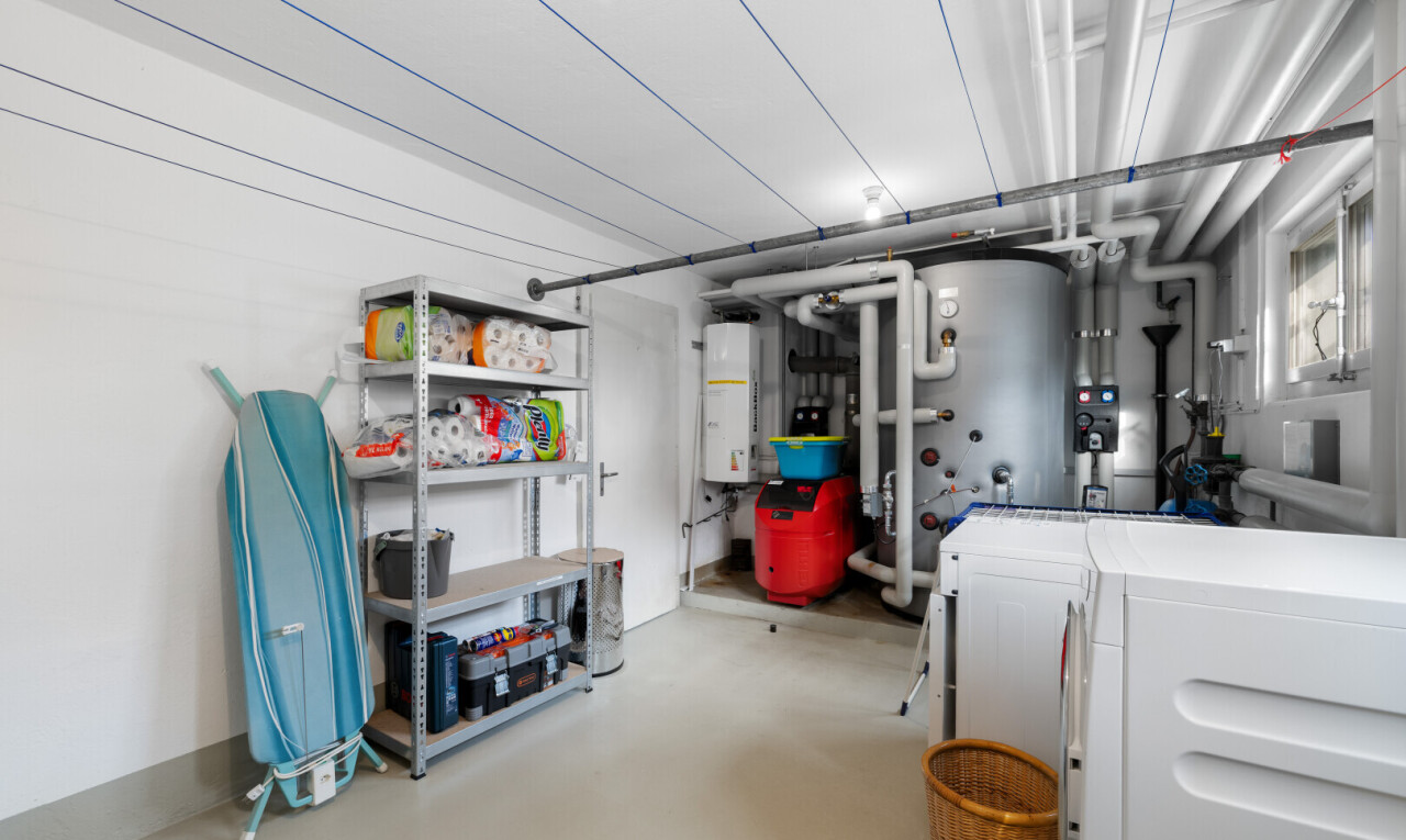 view of parking with water heater
