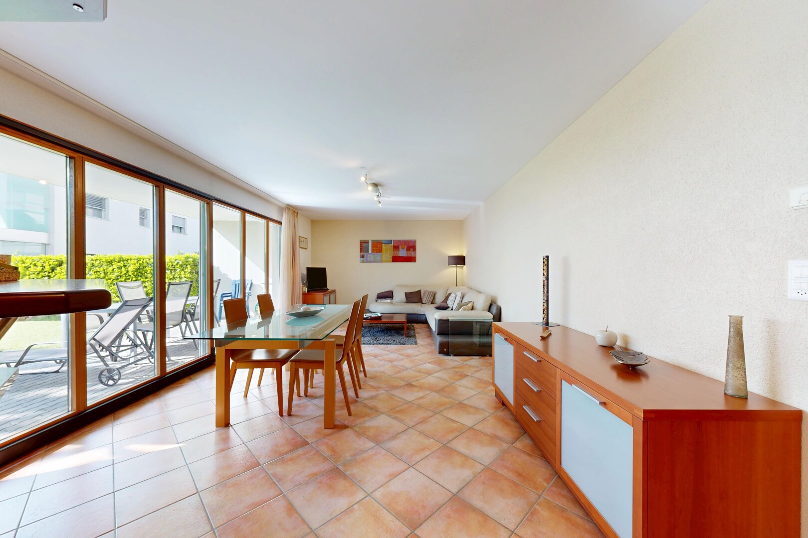 living / dining room featuring light tile patterned floors
